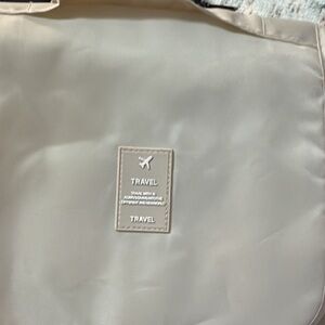 Beige Travel Bag